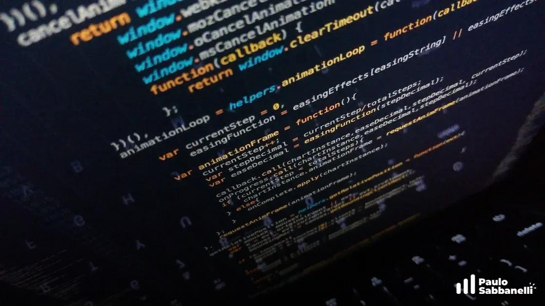 Código JavaScript de animação com teclado refletido de forma sutil na tela do notebook